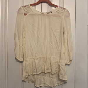 Off white top. Hi-low.